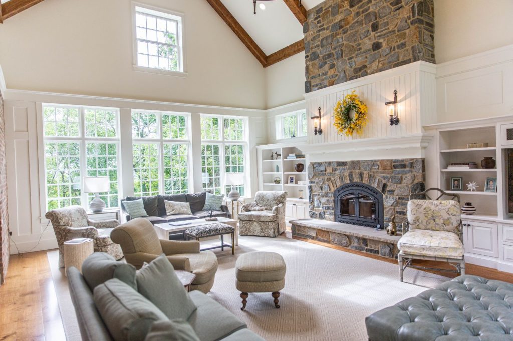 Laslo custom cabinetry for a living room. Custom bookcases and fireplace mantel cleverly designed to hide electrical, allowing for sconces to be added to the fireplace.