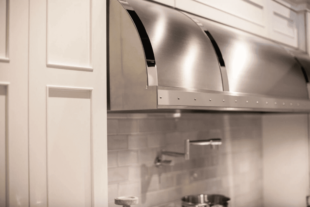Custom metal cooking hood for kitchen