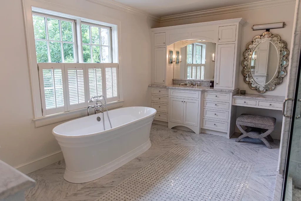 venetian style bathroom remodel with marble tile