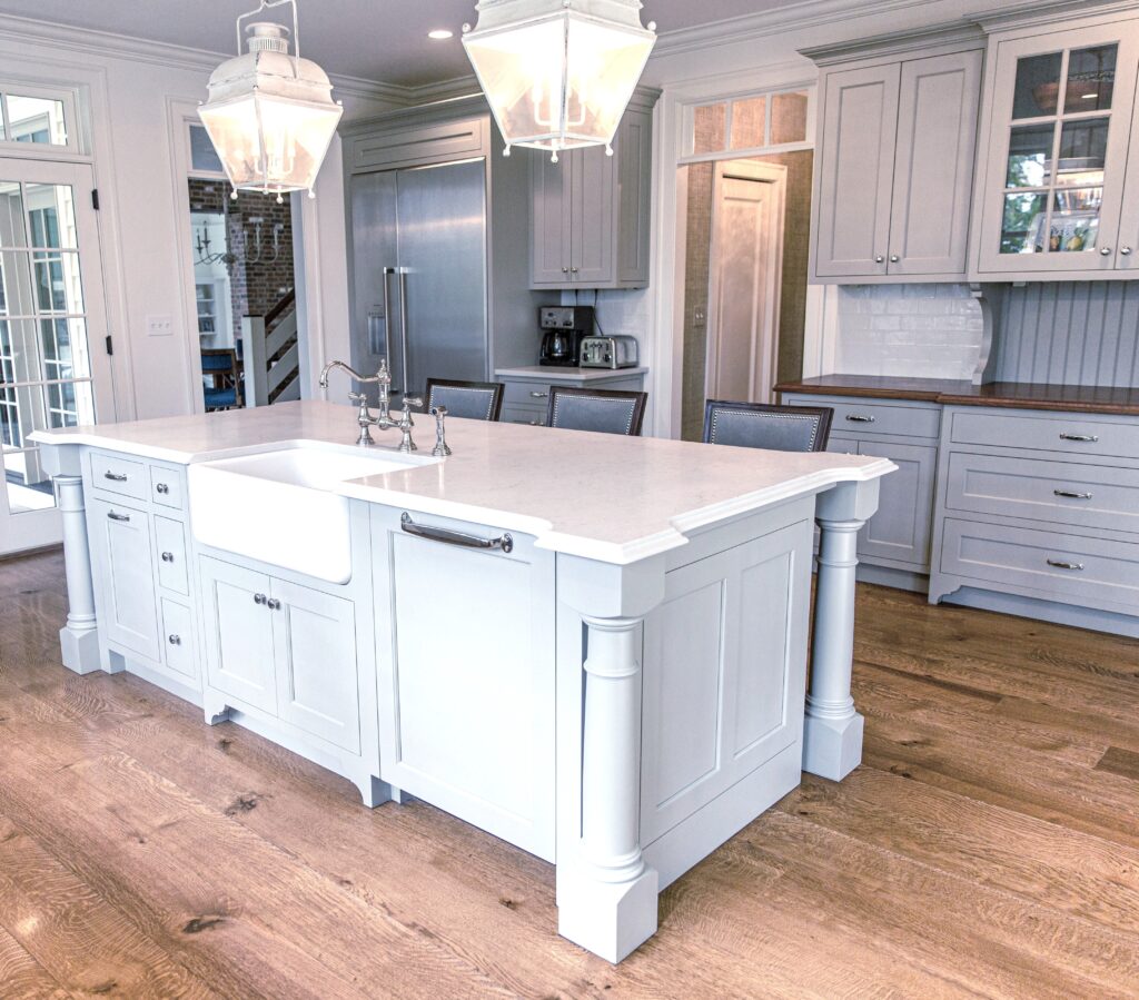 A kitchen features a large island.