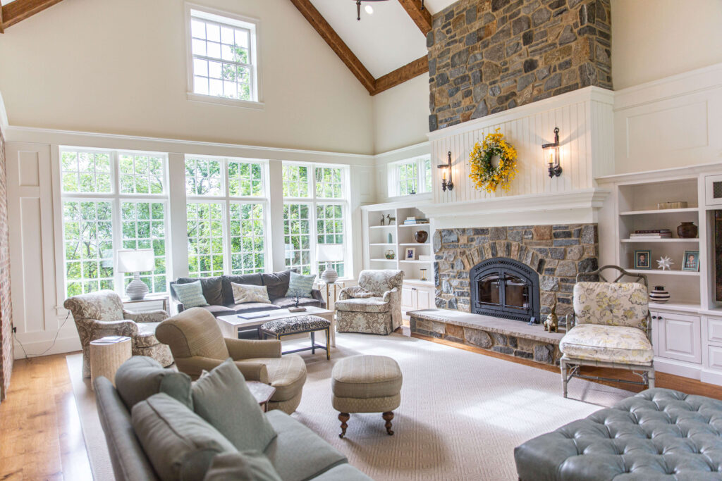 custom living room by laslo kitchens in easton pennsylvania with stonewood a fireplace and white cabinetry