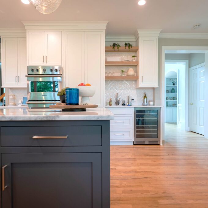 White rift cut oak floating shelves in custom kitchen design Center Valley PA with natural wood accents